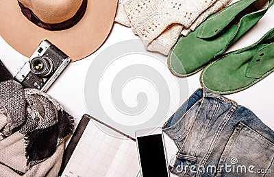 Hat camera sweater jeans phone notebook shoes Stock Photo